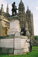Photo of Professor Barry Coward laying the wreath